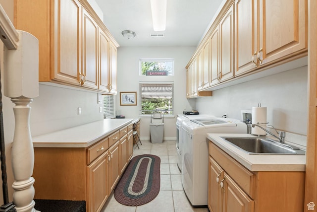 1287 W Bloomington Dr S Unit 7, Bloomington, UT 84790 - washroom with washer and clothes dryer, cabinet space, and light tile patterned floors