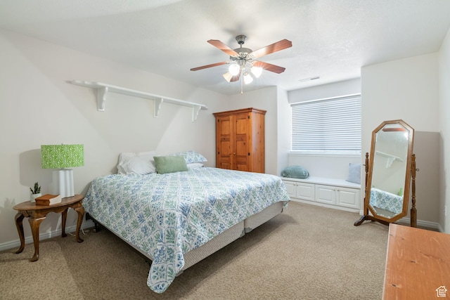 1287 W Bloomington Dr S Unit 7, Bloomington, UT 84790 - bedroom featuring light colored carpet and a ceiling fan