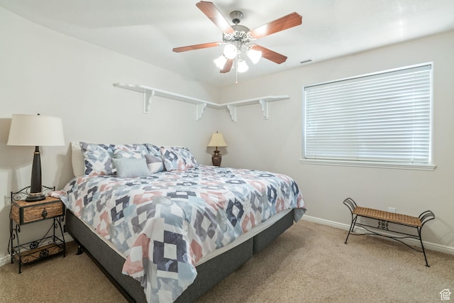 1287 W Bloomington Dr S Unit 7, Bloomington, UT 84790 - carpeted bedroom with baseboards and ceiling fan