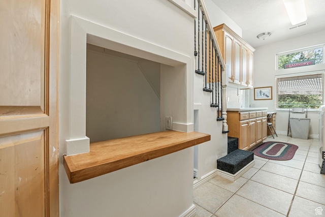 1287 W Bloomington Dr S Unit 7, Bloomington, UT 84790 - mudroom featuring light tile patterned flooring and baseboards