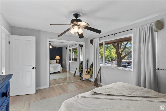 1968 E Licoln Ln S Unit 5A, Holladay, UT 84124 - bedroom featuring light wood-type flooring, baseboards, and ceiling fan