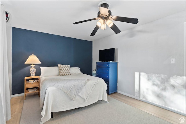 1968 E Licoln Ln S Unit 5A, Holladay, UT 84124 - bedroom with wood finished floors, baseboards, and a ceiling fan