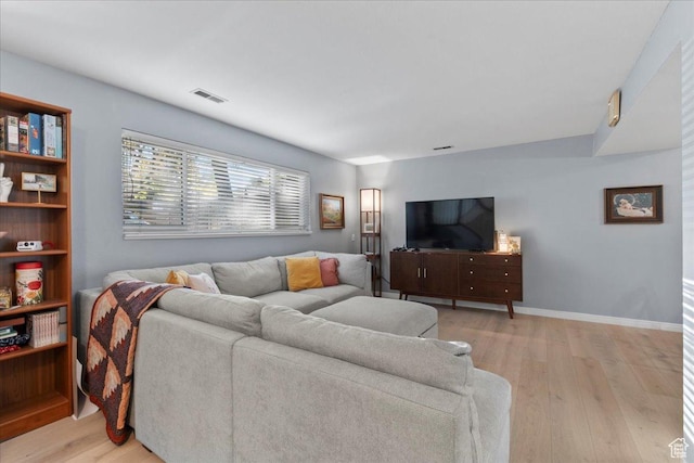 1968 E Licoln Ln S Unit 5A, Holladay, UT 84124 - living room featuring light wood-style flooring and baseboards