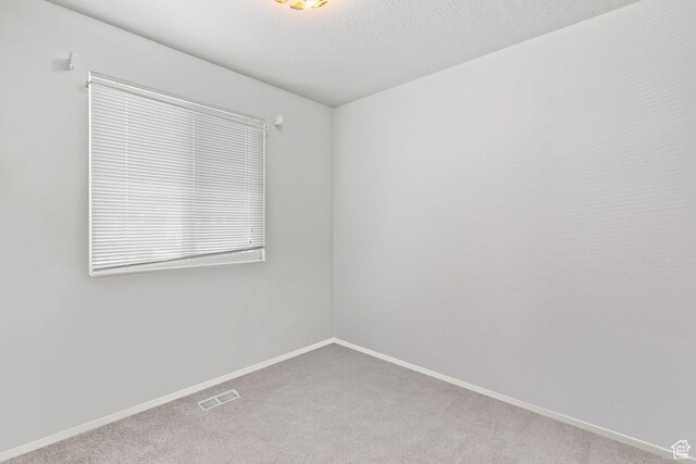 4924 W Barton Park Dr, West Jordan, UT 84081 - carpeted empty room featuring baseboards