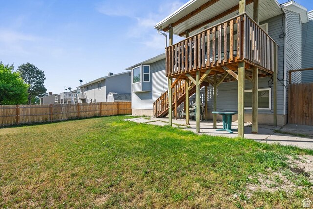 4924 W Barton Park Dr, West Jordan, UT 84081 - back of property with a deck, a patio area, and stairs