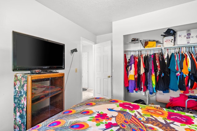 4924 W Barton Park Dr, West Jordan, UT 84081 - bedroom featuring a closet and a textured ceiling