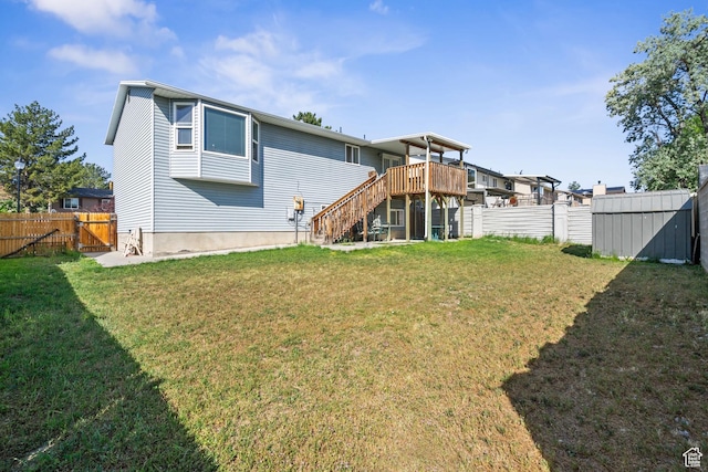 4924 W Barton Park Dr, West Jordan, UT 84081 - back of property featuring stairway, a gate, and a wooden deck