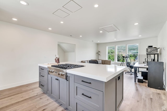 1474 E Rock View Ct, Kamas, UT 84036 - kitchen with gray cabinets, stainless steel gas stovetop, light wood-type flooring, an office area, and recessed lighting
