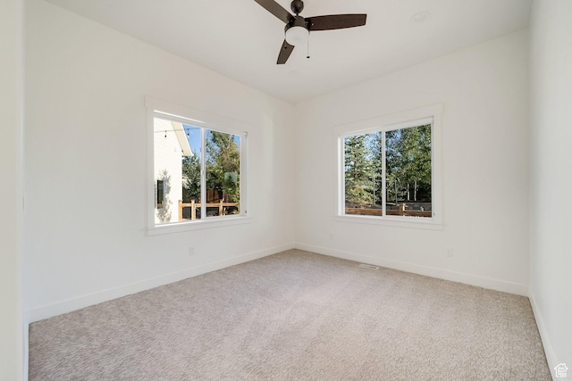 1474 E Rock View Ct, Kamas, UT 84036 - spare room with light carpet, baseboards, and a ceiling fan