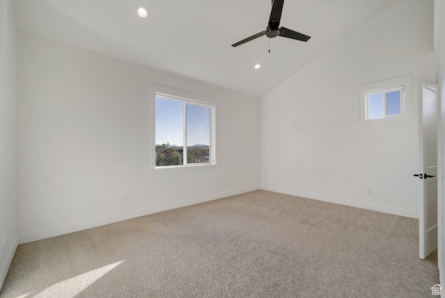 1474 E Rock View Ct, Kamas, UT 84036 - unfurnished room featuring plenty of natural light, light carpet, ceiling fan, vaulted ceiling, and baseboards
