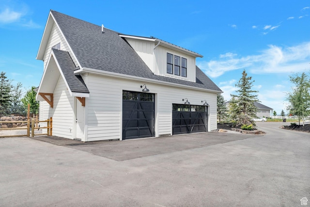 1474 E Rock View Ct, Kamas, UT 84036 - view of property exterior with a shingled roof and board and batten siding