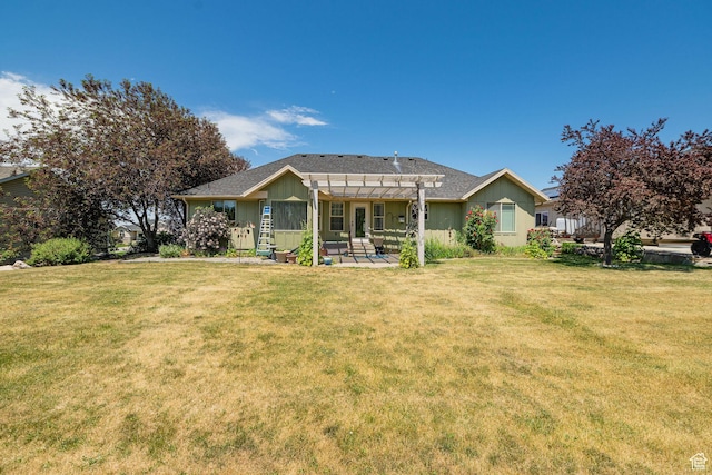 1257 W 3275 S, Perry, UT 84302 - back of house with a pergola, board and batten siding, a patio, and a lawn