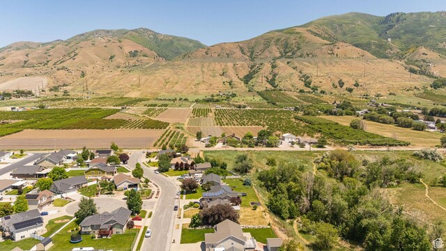 1257 W 3275 S, Perry, UT 84302 - aerial view of property's location featuring a mountainous background and large plots for crops