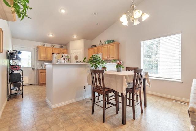 8567 S Cork Oak Dr, West Jordan, UT 84081 - dining room with a chandelier, vaulted ceiling, baseboards, and recessed lighting