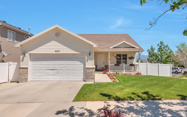 8567 S Cork Oak Dr, West Jordan, UT 84081 - view of front facade featuring a porch, a garage, driveway, and roof with shingles