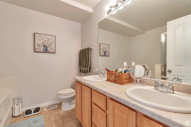 8567 S Cork Oak Dr, West Jordan, UT 84081 - full bathroom featuring double vanity, toilet, baseboards, and a bathtub