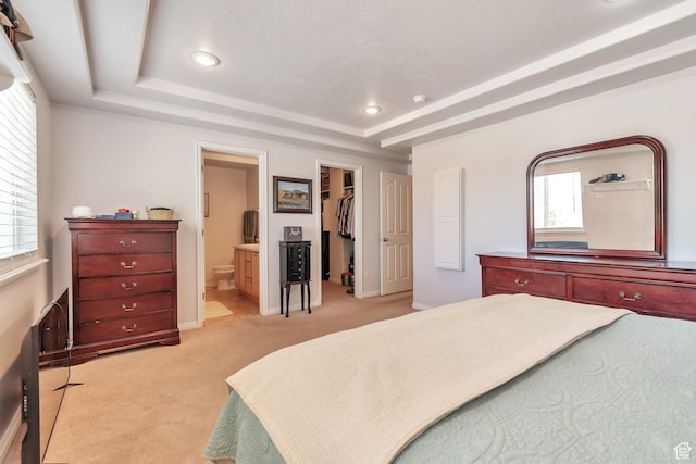 8567 S Cork Oak Dr, West Jordan, UT 84081 - bedroom featuring light carpet, a raised ceiling, a spacious closet, connected bathroom, and recessed lighting
