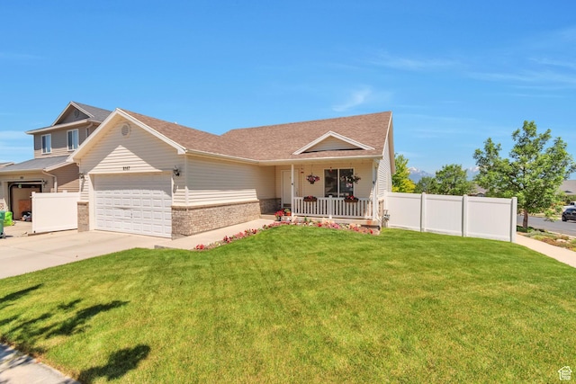 8567 S Cork Oak Dr, West Jordan, UT 84081 - view of front facade featuring covered porch, brick siding, an attached garage, driveway, and a shingled roof