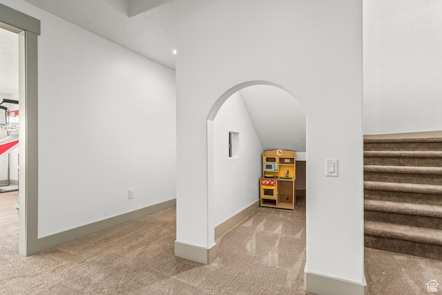 6653 W Dry Creek Ln, Highland, UT 84003 - staircase featuring carpet floors, arched walkways, and baseboards
