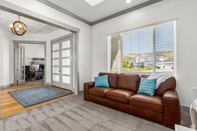 6653 W Dry Creek Ln, Highland, UT 84003 - living room featuring french doors, a chandelier, crown molding, and baseboards