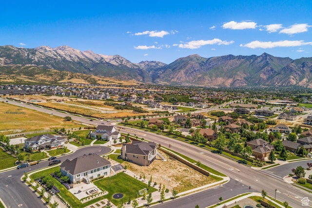 6653 W Dry Creek Ln, Highland, UT 84003 - aerial perspective of suburban area featuring a mountainous background
