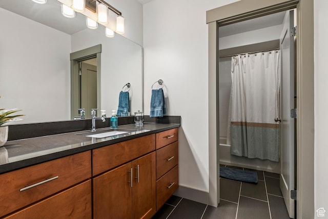 6653 W Dry Creek Ln, Highland, UT 84003 - bathroom featuring tile patterned flooring, vanity, and shower / tub combo