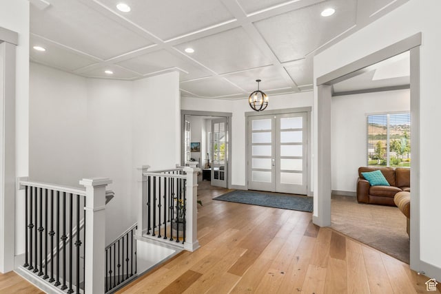 6653 W Dry Creek Ln, Highland, UT 84003 - foyer entrance featuring hardwood / wood-style floors, coffered ceiling, recessed lighting, a chandelier, and baseboards