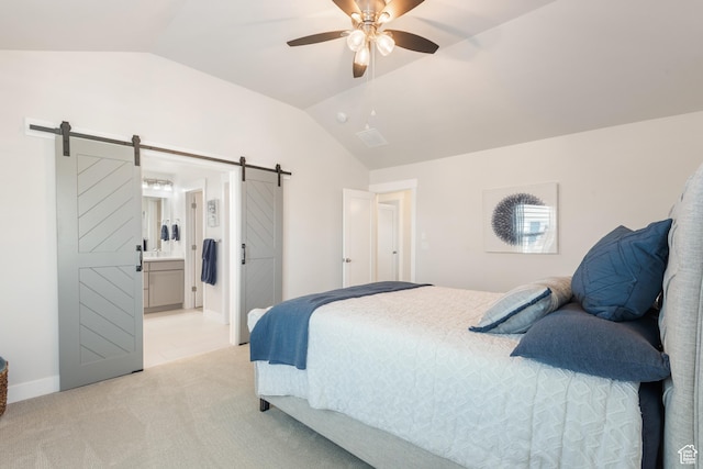 10773 S Beach Comber Way S, Jordan, UT 84009 - bedroom with a barn door, lofted ceiling, light colored carpet, ensuite bathroom, and ceiling fan