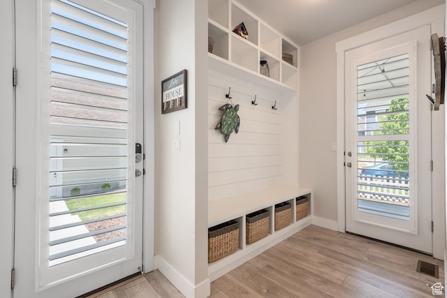 10773 S Beach Comber Way S, Jordan, UT 84009 - mudroom with light wood-style flooring and baseboards