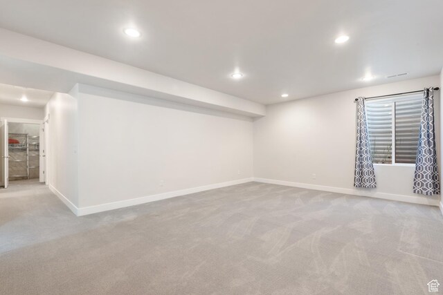 10773 S Beach Comber Way S, Jordan, UT 84009 - finished basement featuring light carpet, recessed lighting, and baseboards