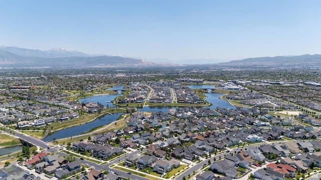 10773 S Beach Comber Way S, Jordan, UT 84009 - aerial view of property's location featuring nearby suburban area and a water and mountain view