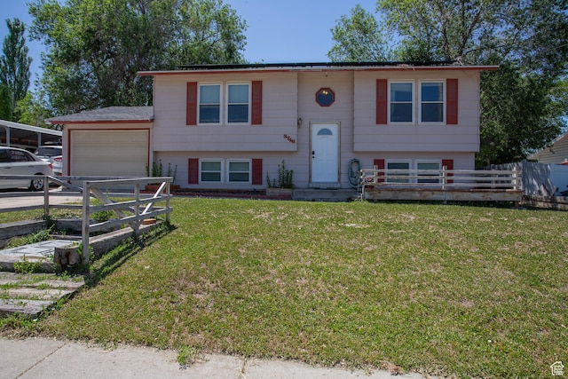 3746 S 7200 W, Magna, UT 84044 - bi-level home with a garage and driveway