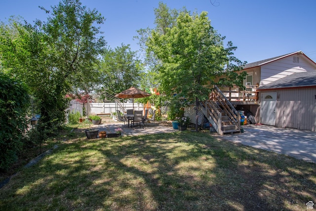 3746 S 7200 W, Magna, UT 84044 - view of yard with a patio, stairs, and a wooden deck