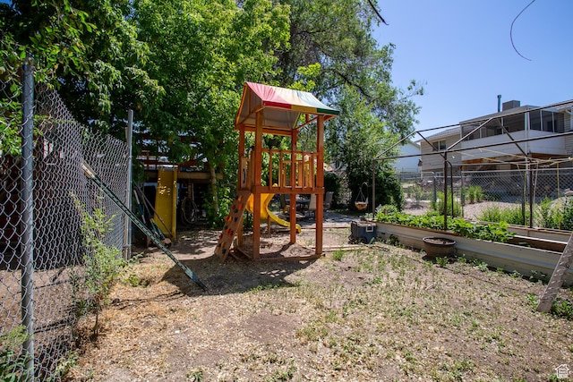 3746 S 7200 W, Magna, UT 84044 - view of play area featuring a garden