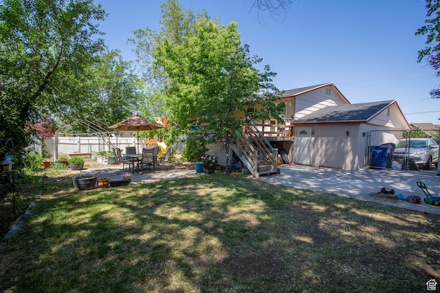 3746 S 7200 W, Magna, UT 84044 - view of yard featuring a patio, a deck, and stairs