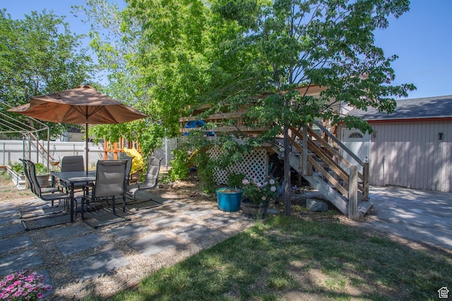 3746 S 7200 W, Magna, UT 84044 - view of patio featuring stairs and outdoor dining space