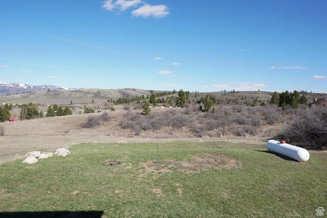 1204 Hyperion Way, Soda Springs, ID 83276 - view of grassy yard featuring a mountain view
