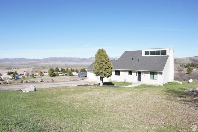 1204 Hyperion Way, Soda Springs, ID 83276 - rear view of property with a yard and a mountain view