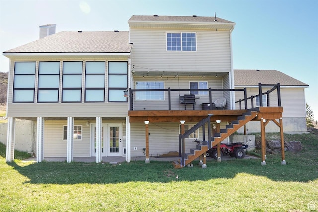 1204 Hyperion Way, Soda Springs, ID 83276 - rear view of house featuring a deck, stairway, a lawn, and a shingled roof