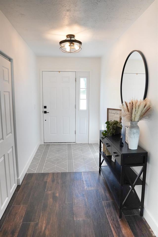 1204 Hyperion Way, Soda Springs, ID 83276 - foyer entrance with baseboards and wood finished floors