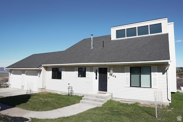 1204 Hyperion Way, Soda Springs, ID 83276 - view of front facade featuring a front lawn, an attached garage, concrete driveway, and roof with shingles