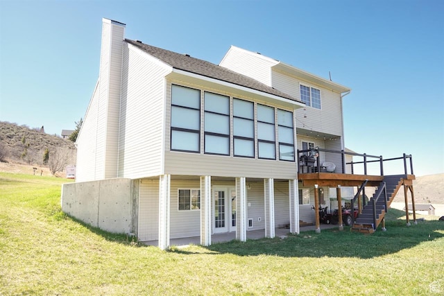 1204 Hyperion Way, Soda Springs, ID 83276 - rear view of house with stairs, a yard, a deck, and a chimney