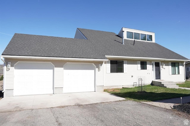 1204 Hyperion Way, Soda Springs, ID 83276 - view of front of house featuring concrete driveway, an attached garage, a shingled roof, and a front yard