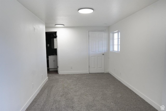 1204 Hyperion Way, Soda Springs, ID 83276 - spare room with carpet floors, baseboards, and a sink
