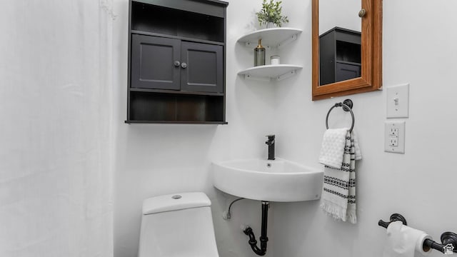 23 W Cottage Ave, Sandy, UT 84070 - bathroom featuring toilet and a sink
