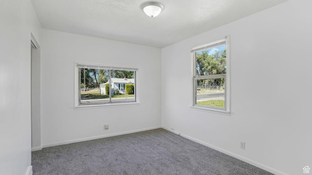 23 W Cottage Ave, Sandy, UT 84070 - carpeted spare room featuring healthy amount of natural light and baseboards