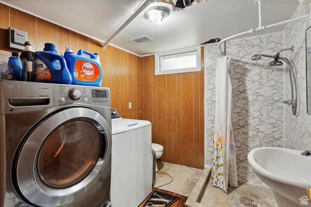 339 S Main St, Smithfield, UT 84335 - washroom featuring washer / dryer and wood walls