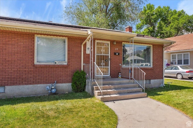 339 S Main St, Smithfield, UT 84335 - ranch-style house featuring a front lawn, brick siding, and crawl space