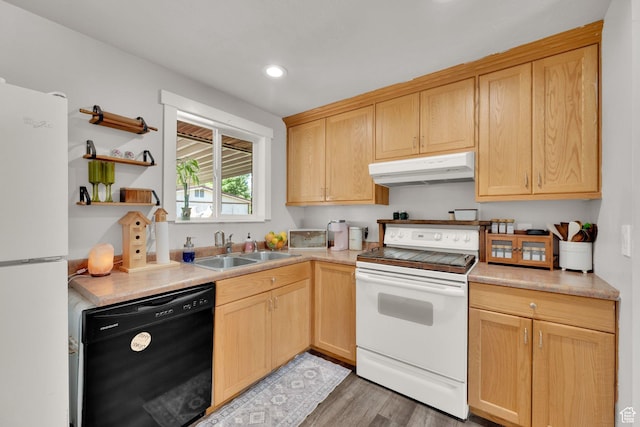 648 W 2200 N, Clinton, UT 84015 - kitchen with under cabinet range hood, white appliances, a sink, light wood-style floors, and light brown cabinetry