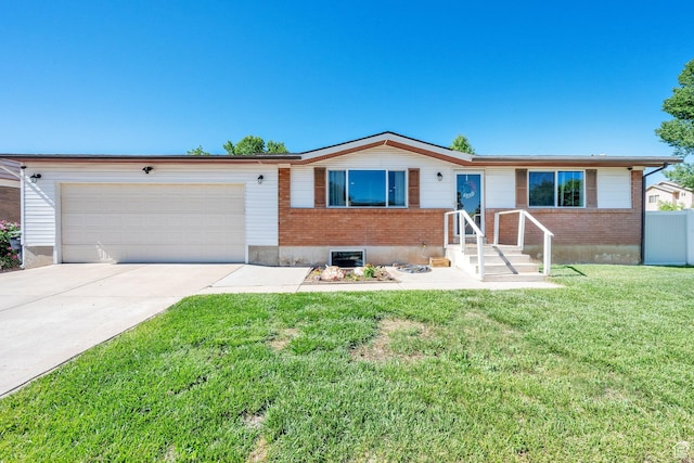648 W 2200 N, Clinton, UT 84015 - single story home with brick siding, a garage, and concrete driveway